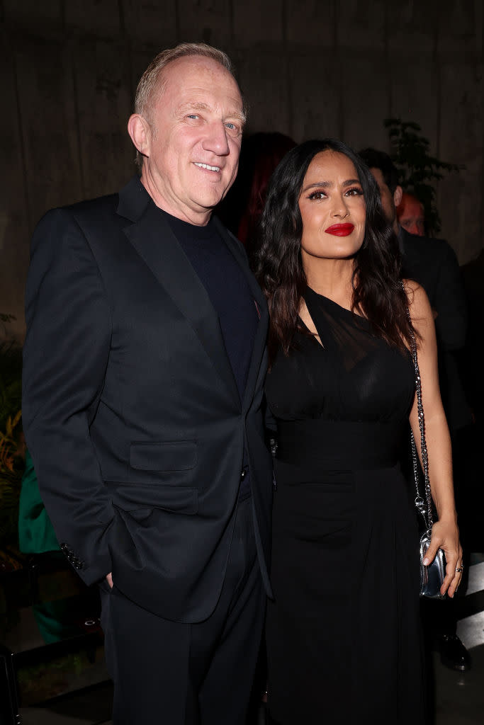 François-Henri Pinault and Salma Hayek arrive at the Gucci cruise 2025 fashion show on May 13 in London.