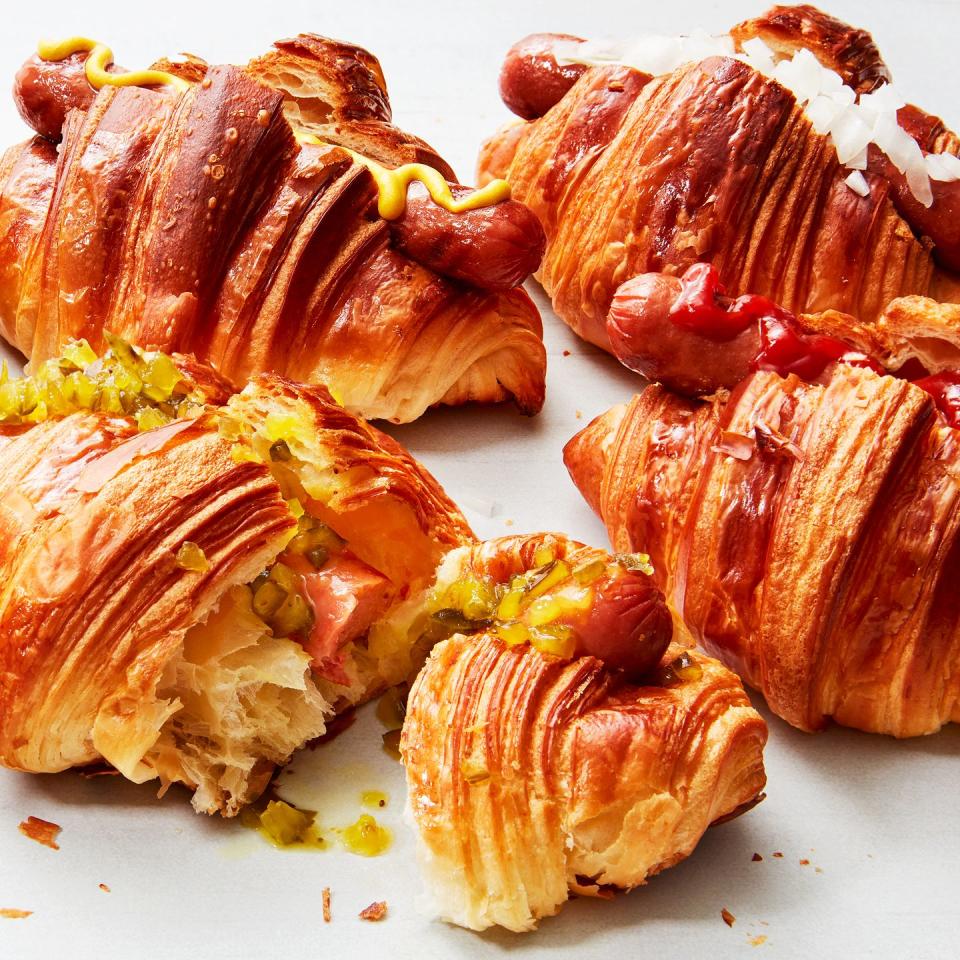 hot dogs in croissants with toppings