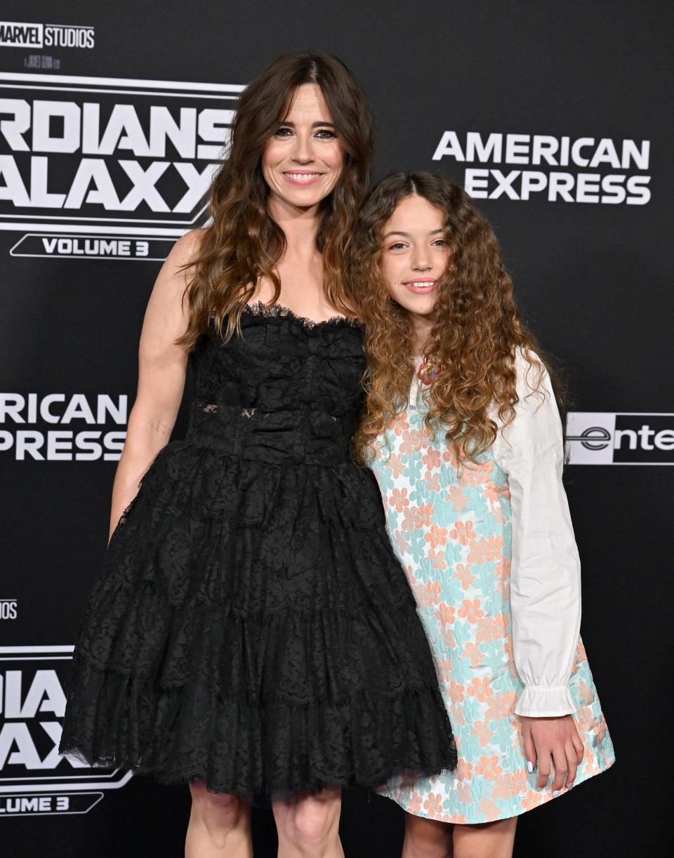 Linda Cardellini and Lilah-Rose Rodriguez attend the World Premiere of Marvel Studios' "Guardians of the Galaxy Vol. 3" on April 27, 2023 in Hollywood, California.