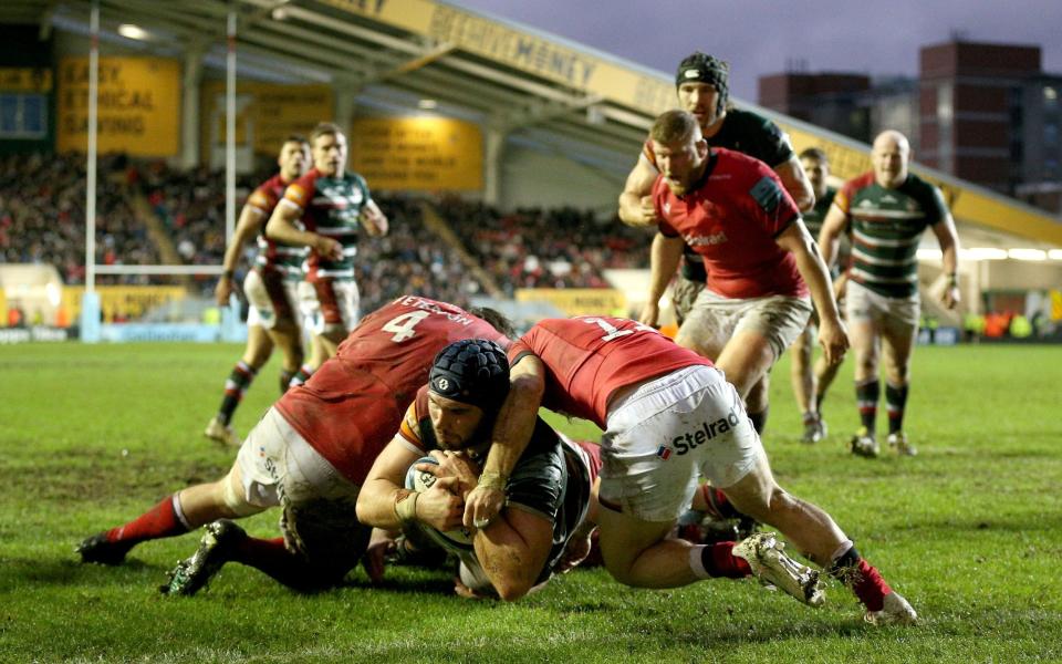  Leicester Tigers' George Martin (centre) dives in to score his sides third try during the Gallagher Premiership match at Mattioli Woods Welford Road Stadium, Leicester. Picture date: Sunday January 2, 2022. - PA