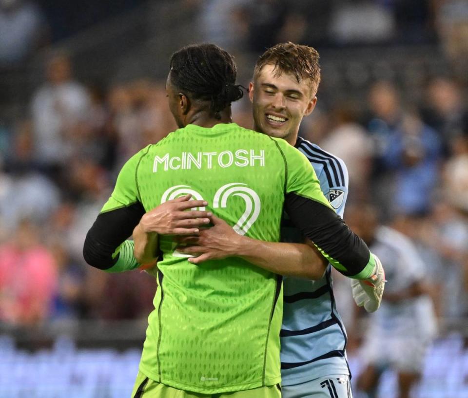 Sporting Kansas City’s Kendall McIntosh (22) and Jake Davis (17) celebrate their win against Minnesota United FC after the game at Children’s Mercy Park on May 13, 2023. Peter Aiken/USA TODAY Sports