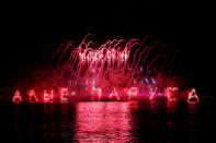 Fireworks explode along the Neva River, the during the Scarlet Sails festivities marking school graduation, in St. Petersburg, Russia,June 24, 2018. REUTERS/Henry Romero