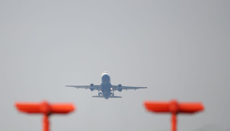 FILE PHOTO: A British Airways aircraft takes off from Heathrow Airport in west London