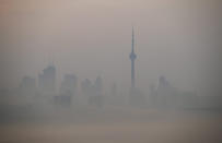 <p>The city skyline is seen during a foggy morning in Toronto, May 27, 2016. (Mark Blinch/The Canadian Press via AP) </p>