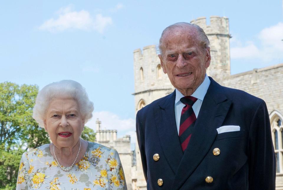 Queen Elizabeth II and Prince Philip the Duke of Edinburgh pose on June 1, 2020, in the Quadrangle of Windsor Castle, ahead of his 99th birthday on June 10.