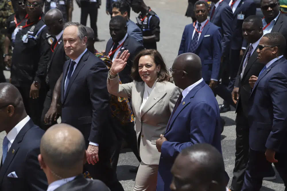 U.S. Vice President Kamala Harris waves as she arrives in Accra, Ghana, Sunday March 26, 2023. (AP Photo/Misper Apawu)