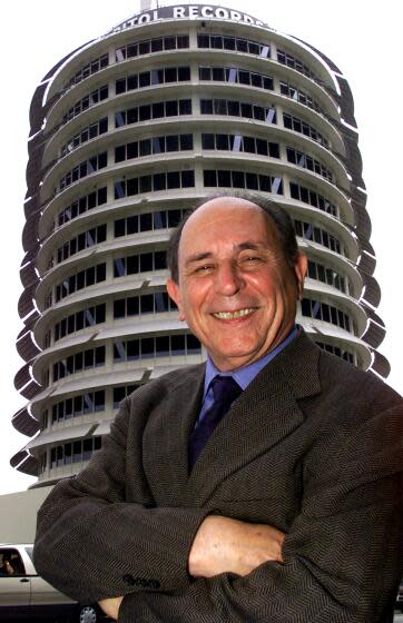 007626.SF.0505.capitol.1.AS Photograph of architect Lou Naidorf in front of the Capitol Records building, one of several Los Angeles landmarks he designed, to illustrate story on his retirement after 10 years as dean of architecture at Woodbury University.