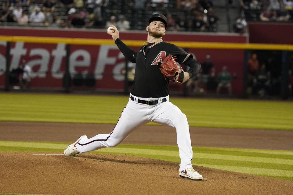 Arizona Diamondbacks pitcher Ryne Nelson throws against the Washington Nationals in the first inning during a baseball game, Sunday, May 7, 2023, in Phoenix. (AP Photo/Darryl Webb)