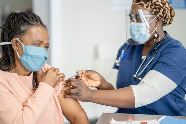 Experts believe vaccinations are the key component to the virus stabilising. (Photo: FatCamera via Getty Images)