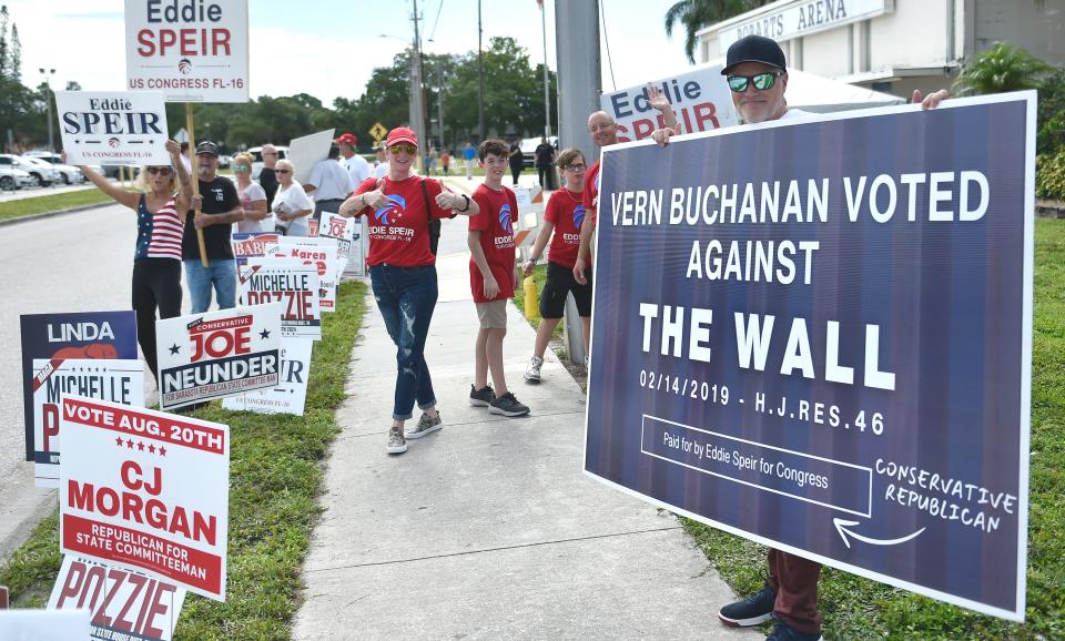 Outside was a couple protesters and volunteers stumping for their candidates during Saturday's Sarasota County Republican Candidates annual "Pie Rally" held at Robarts Arena in Sarasota.