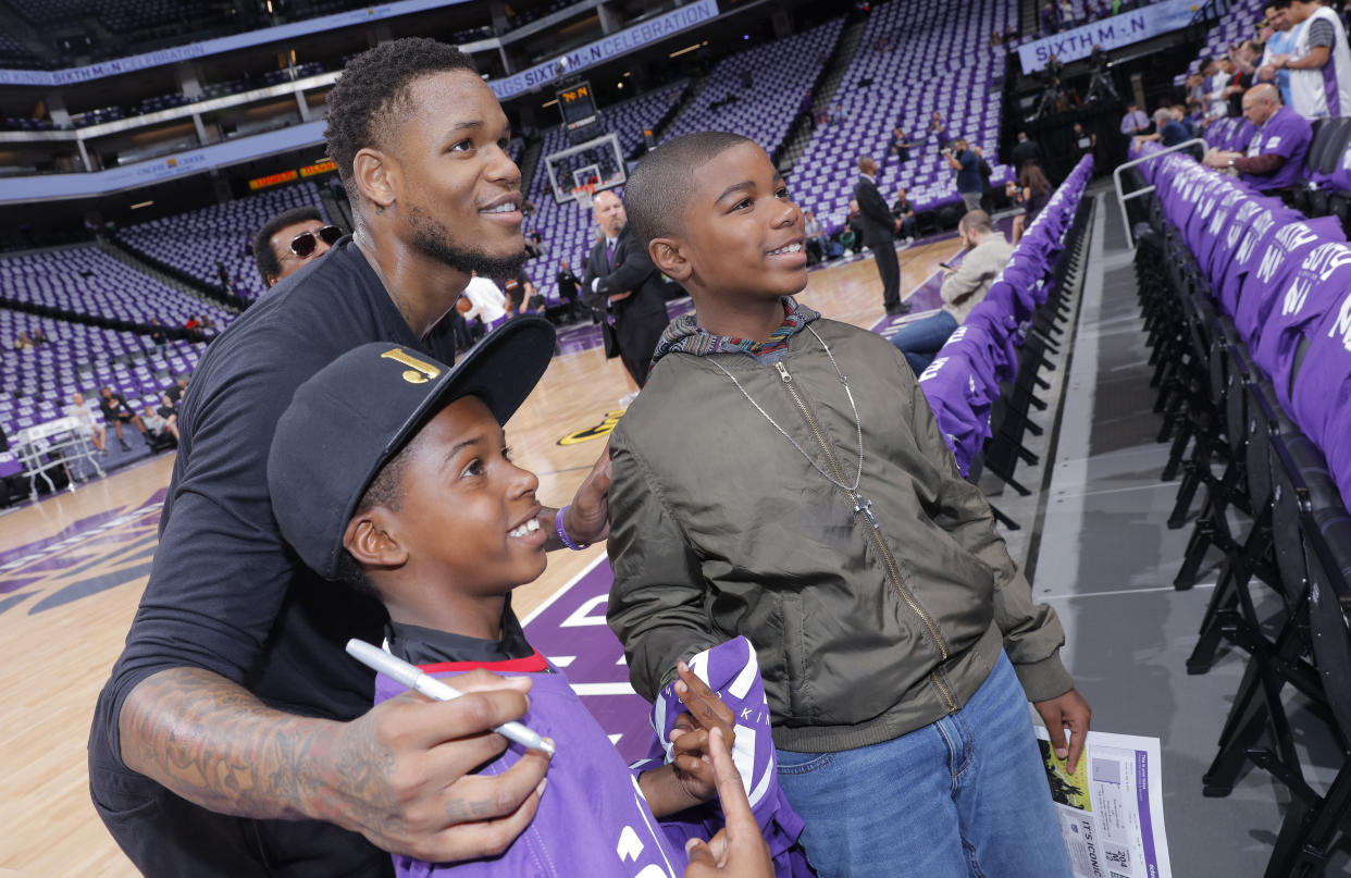 Ben McLemore, posing here with Kings fans in 2017, was traded back to Sacramento last month. (Getty Images)