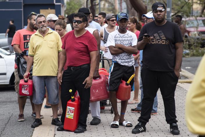 SAN JUAN, PUERTO RICO - SEPTEMBER 22: Residents line up for gasoline days after Hurricane Maria made landfall, on September 22, 2017 in San Juan, Puerto Rico. Many on the island have lost power, running water, and cell phone service after Hurricane Maria, a category 4 hurricane, passed through. (Photo by Alex Wroblewski/Getty Images)