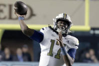 Georgia Tech quarterback Taisun Phommachanh (17) passes during the first half of an NCAA college football game against North Carolina, Saturday, Nov. 19, 2022, in Chapel Hill, N.C. (AP Photo/Chris Seward)