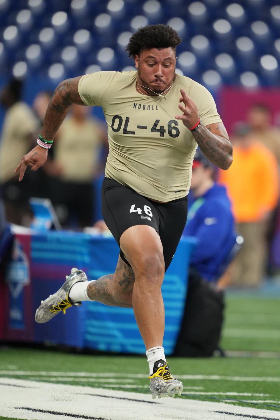 Boston College offensive lineman Christian Mahogany runs during the NFL scouting combine at Lucas Oil Stadium, March 3, 2024 in Indianapolis.