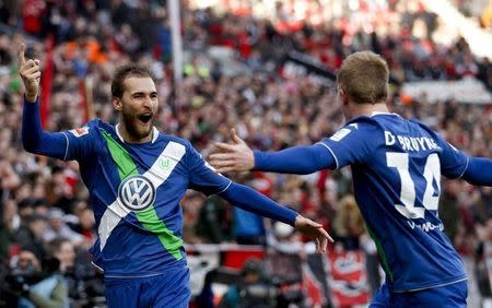 Wolfsburg's Bas Dost celebrates after scoring a goal during their Bundesliga first division soccer match against Bayer Leverkusen in Leverkusen February 14, 2015. REUTERS/Ina Fassbender