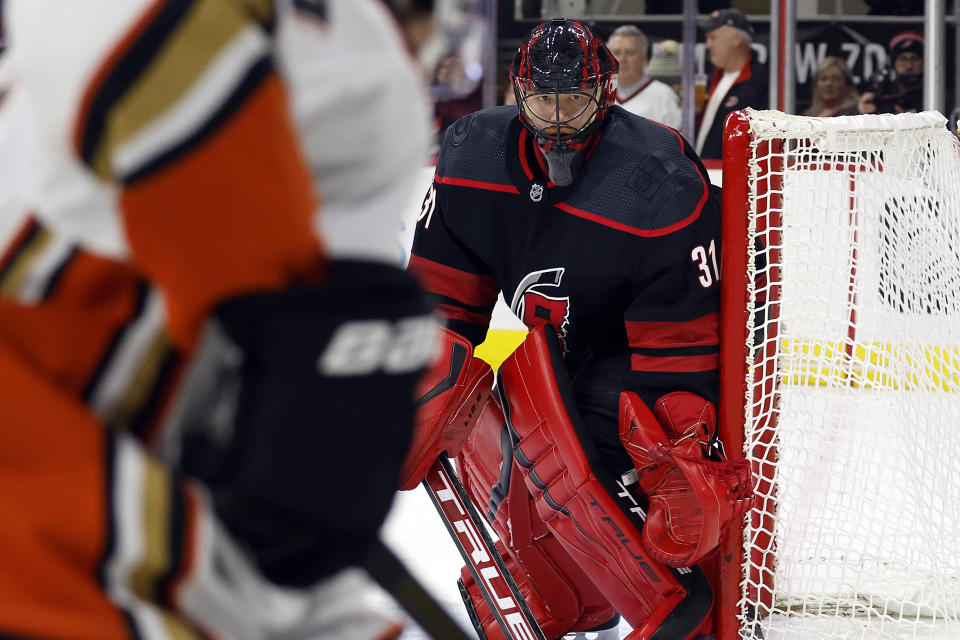 Carolina Hurricanes goaltender Frederik Andersen (31) watches the puck during the first period of an NHL hockey game against the Anaheim Ducks in Raleigh, N.C., Saturday, Feb. 25, 2023. (AP Photo/Karl B DeBlaker)