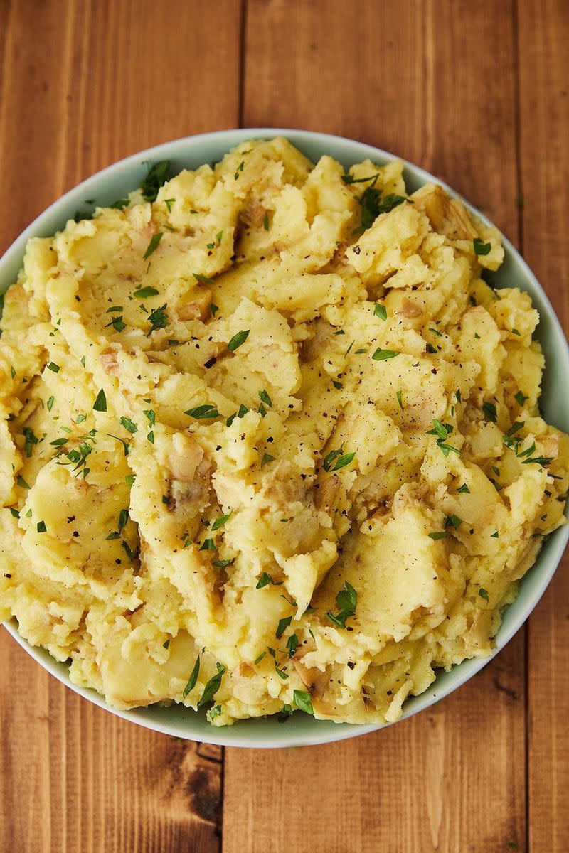 <p>Amazing, creamy mashed potatoes are still possible while being completely dairy free and these are here to prove it! If you're still slightly tempted by real butter then go ahead, but here's our vegan version!</p><p>Get the <a href="https://www.delish.com/uk/cooking/recipes/a28782388/best-vegan-mashed-potatoes-recipe/" rel="nofollow noopener" target="_blank" data-ylk="slk:Vegan Mashed Potatoes;elm:context_link;itc:0;sec:content-canvas" class="link ">Vegan Mashed Potatoes</a> recipe.</p>