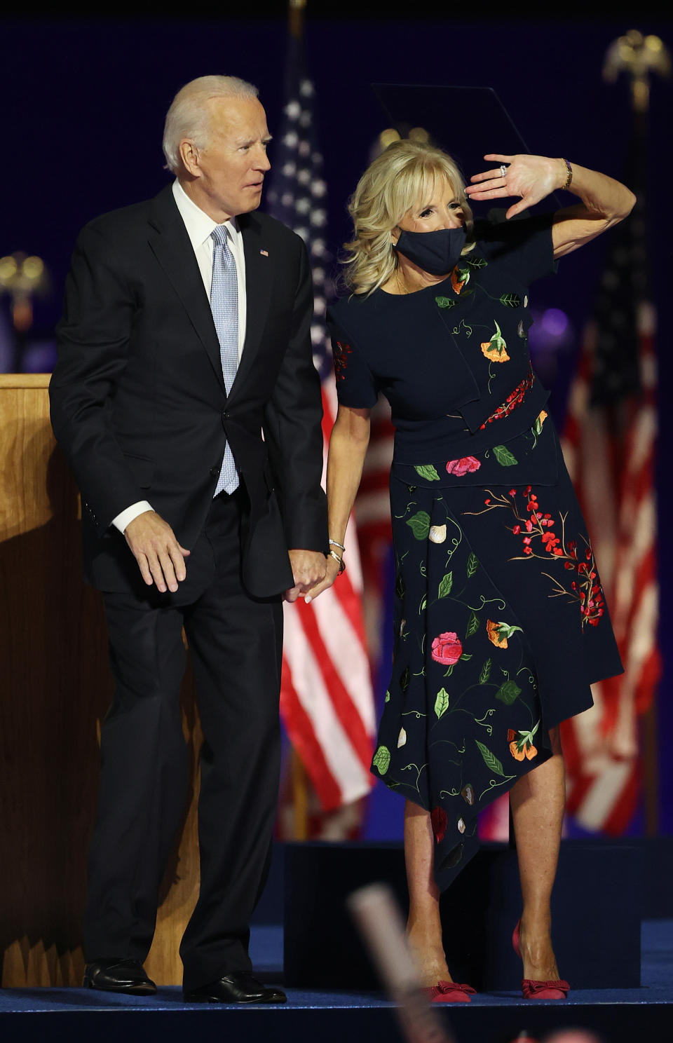 President-elect Joe Biden and Jill Biden wave to the crowd after Biden's address to the nation from the Chase Center November 07, 2020 in Wilmington, Delaware. After four days of counting the high volume of mail-in ballots in key battleground states due to the coronavirus pandemic, the race was called for Biden after a contentious election battle against incumbent Republican President Donald Trump. (Photo by Tasos Katopodis/Getty Images)