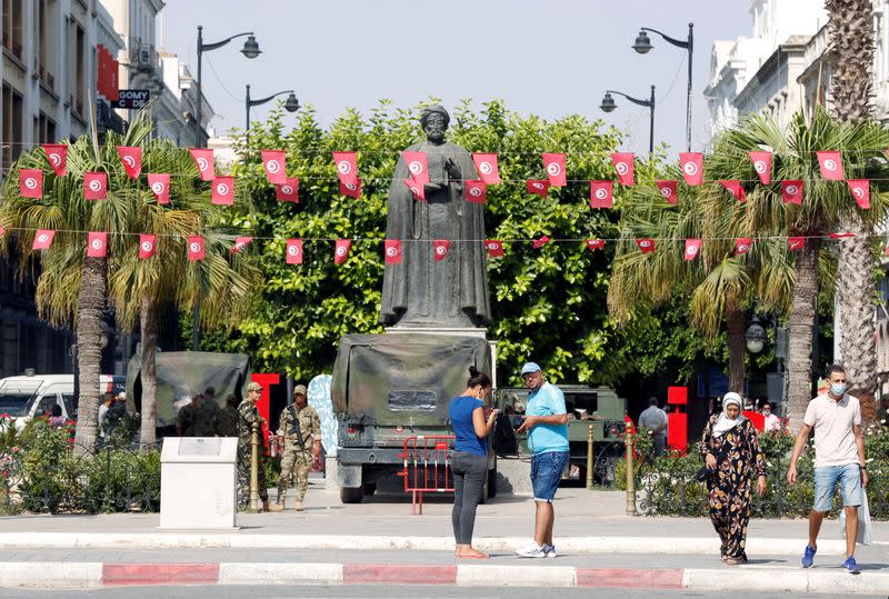 People walk in the center of Tunis