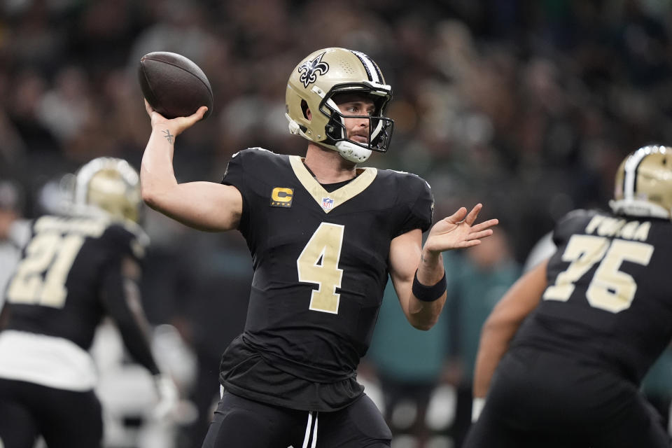 New Orleans Saints quarterback Derek Carr (4) passes against the Philadelphia Eagles in the first half of an NFL football game in New Orleans, Sunday, Sept. 22, 2024. (AP Photo/Gerald Herbert)