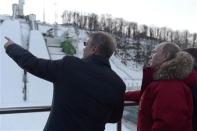 Russian President Vladimir Putin (R) and Sberbank President German Gref (L) visit Olympic venues near Sochi January 3, 2014. REUTERS/Alexei Nikolskiy/RIA Novosti/Kremlin