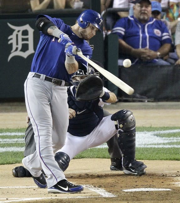 Texas Rangers' Josh Hamilton gets a single in the first inning