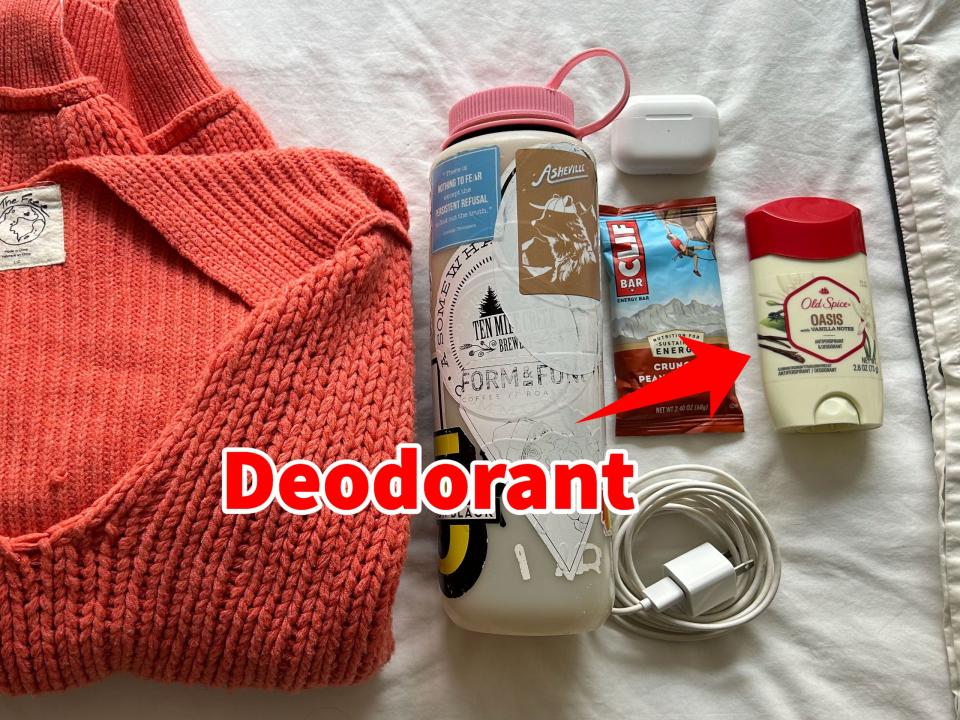 A small arrow pointing to a stick of deodorant