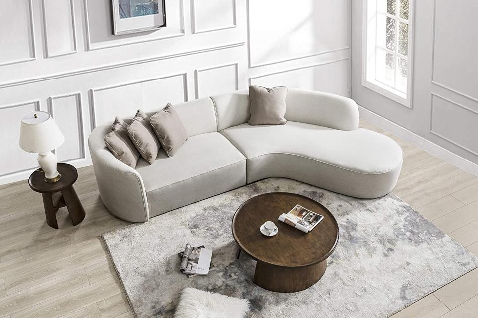 <p><a href="https://www.amazon.com/Acanva-Upholstery-2-Piece-Sectional-Leathaire/dp/B095RK5YWP/ref=sr_1_12?dchild=1&keywords=luxury%2Bcouches&qid=1633380912&refinements=p_72%3A1248915011%2Cp_36%3A1253527011&rnid=386465011&s=home-garden&sr=1-12&th=1&tag=syn-yahoo-20&ascsubtag=%5Bartid%7C10067.g.37857890%5Bsrc%7Cyahoo-us" rel="nofollow noopener" target="_blank" data-ylk="slk:Shop Now;elm:context_link;itc:0;sec:content-canvas" class="link ">Shop Now</a></p><p>Leathaire Couch</p><p>$1327.16</p>