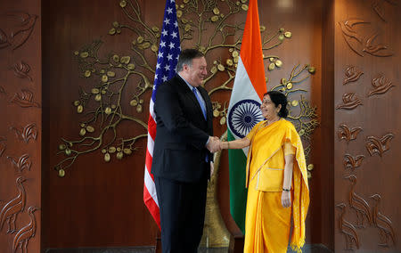 U.S. Secretary of State Mike Pompeo shakes hands with India’s Foreign Minister Sushma Swaraj before the start of their meeting in New Delhi, September 6, 2018. REUTERS/Adnan Abidi