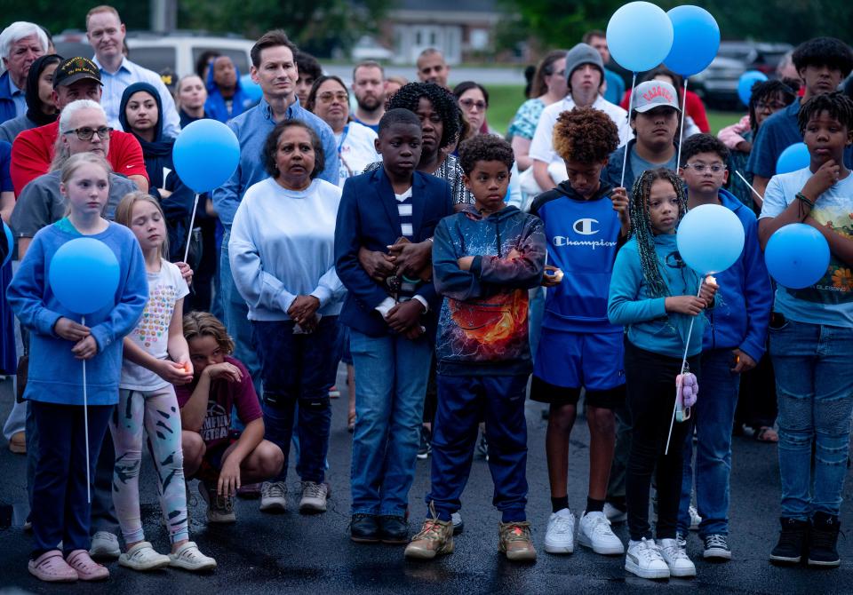 Classmates, friends and members of the community attend the vigil for Yousuf Ayesh at Black Fox Elementary in Murfreesboro, Tenn., Friday, May 17, 2024. The 11-year-old died Tuesday after being diagnosed with cancer in autumn of last year. More than 200 members of the community showed up to celebrate and remember the well-loved fifth-grader.