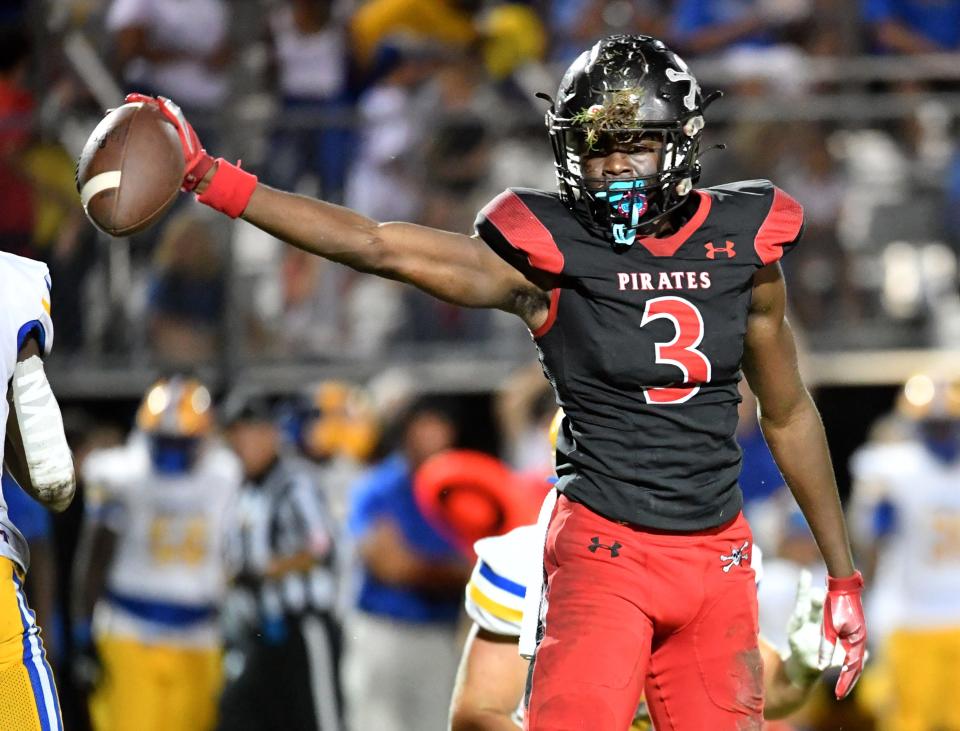 Port Charlotte wide receiver Jamal Streeter, Jr. (#3) indicates a first down for the Pirates. The Port Charlotte High Pirates hosted the Charlotte High Tarpons on Friday, Sept. 2, 2022.