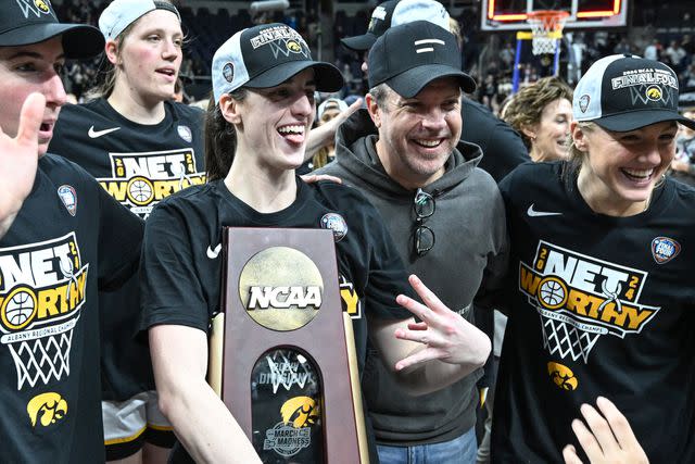 <p>Greg Fiume/NCAA Photos via Getty</p> Caitlin Clark #22 of the Iowa Hawkeyes celebrates with Jason Sudeikis