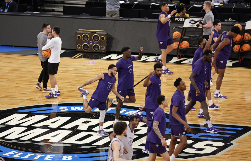 Kansas State guard Markquis Nowell (1) stretches with teammates during practice before a Sweet 16 college basketball game at the NCAA East Regional of the NCAA Tournament, Wednesday, March 22, 2023, in New York. (AP Photo/Adam Hunger)