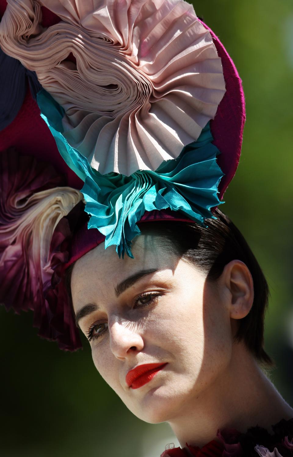 British model Erin O'Connor poses for photographers during 'Ladies Day' on the first day of the Epsom Derby Festival in Surrey, southern England, on June 3, 2011. The Epsom Derby race will be run Saturday June 4, 2011. AFP PHOTO/ ADRIAN DENNIS (Photo credit should read ADRIAN DENNIS/AFP/Getty Images)