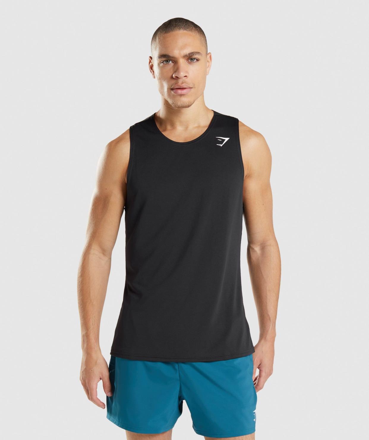 <p><a href="https://go.redirectingat.com?id=74968X1596630&url=https%3A%2F%2Fwww.gymshark.com%2Fproducts%2Fgymshark-arrival-tank-black-ss22&sref=https%3A%2F%2F" rel="nofollow noopener" target="_blank" data-ylk="slk:Shop Now;elm:context_link;itc:0;sec:content-canvas" class="link rapid-noclick-resp">Shop Now</a></p><p>Arrival Tank Black</p><p>gymshark.com</p><p>$14.00</p>