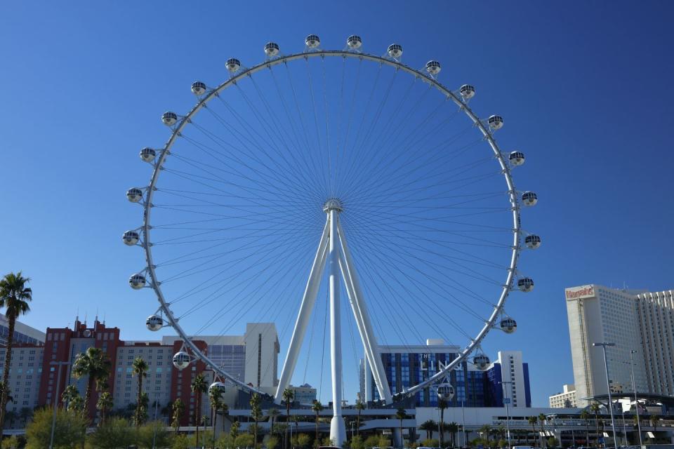 <p>The <a href="https://www.tripadvisor.com/Attraction_Review-g45963-d6509306-Reviews-High_Roller-Las_Vegas_Nevada.html" rel="nofollow noopener" target="_blank" data-ylk="slk:Las Vegas High Roller;elm:context_link;itc:0;sec:content-canvas" class="link ">Las Vegas High Roller</a> is currently the tallest ferris wheel in the world, extending skyward to a staggering 550 feet. It's right on the Las Vegas Strip, as part of the LINQ project. The wheel features 28 high-tech, glass-enclosed cabins, each one giving riders a spectacular view of the city. Riders also get experiences like chocolate tastings and even personalized yoga sessions. And of course, it wouldn't be Vegas without the option of an Open Bar Cabin.<br></p>