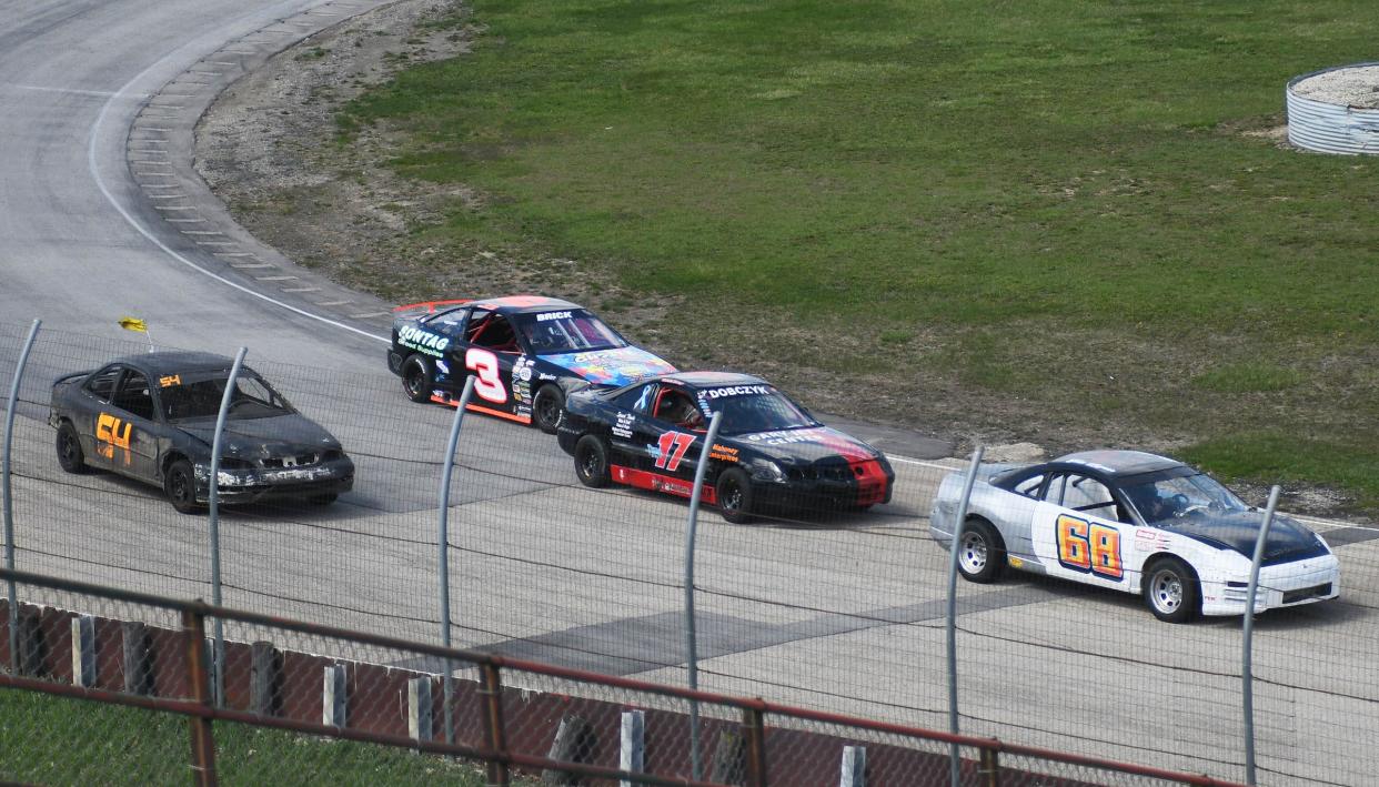 Pure stocks can be seen exiting turn four at a recent practice session at Grundy County Speedway.