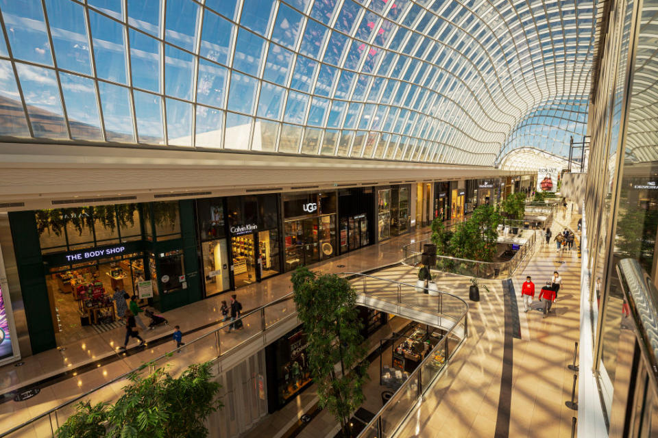 MELBOURNE, AUSTRALIA - OCTOBER 28: People are seen shopping at Chadstone Shopping Centre on October 28, 2020 in Melbourne, Australia. Lockdown restrictions in Melbourne lifted as of midnight with people able to leave their home for any reason. Cafes, restaurants, pubs and bars can reopen subject to patron limits while beauty services, tattoo parlours and any other service where you can wear a mask will be able to resume. Up to 10 people from any number of households will be able to gather outdoors, however, Victorians are still required to wear a face mask in public. Metropolitan Melbourne has been subject to Stage 4 restrictions since 2 August 2020 with residents under stay at home orders following a second wave of COVID-19 cases in the community. (Photo by Daniel Pockett/Getty Images)