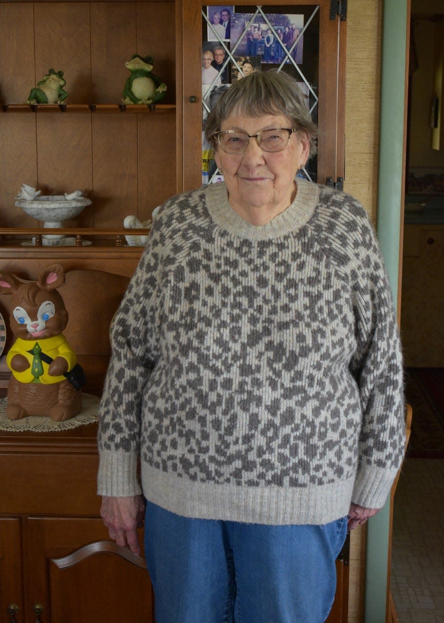 Beverly Schaar stands in her home of 22 years that she nearly had to sell when she could no longer afford the mortgage payments. A GoFundMe account has been established to help her.