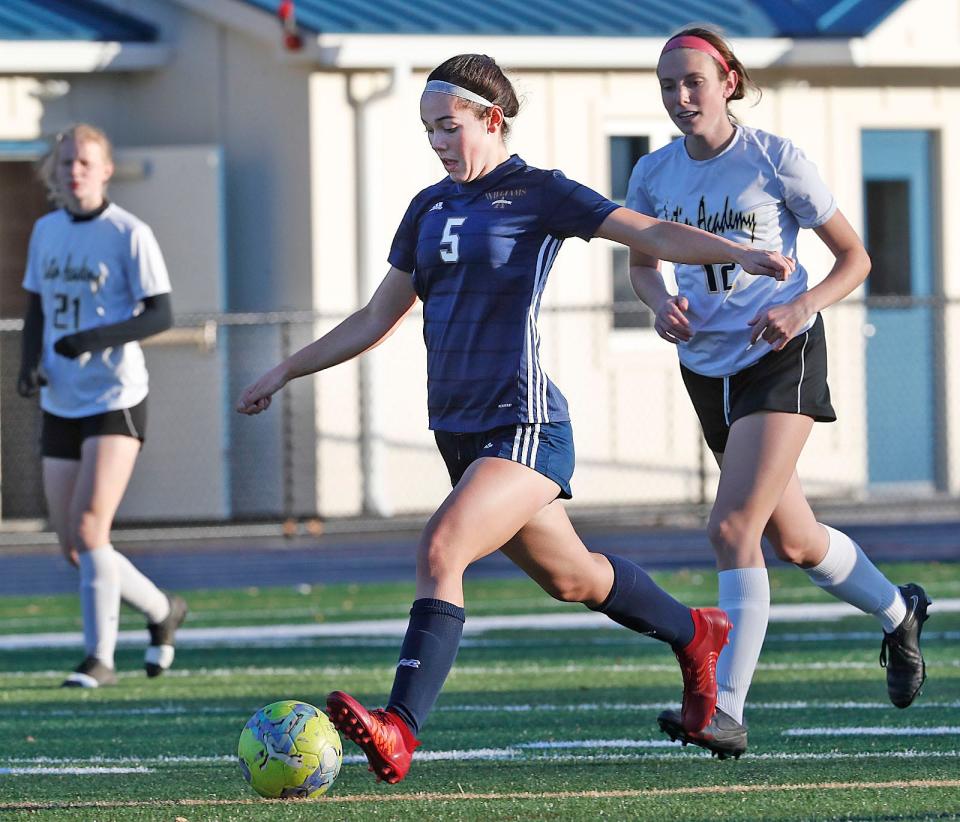 Archbishop Williams' Maeve White scores her record-breaking 88th career goal in an MIAA preliminary round game vs. Boston Latin Academy on Friday, Nov. 3, 2023.