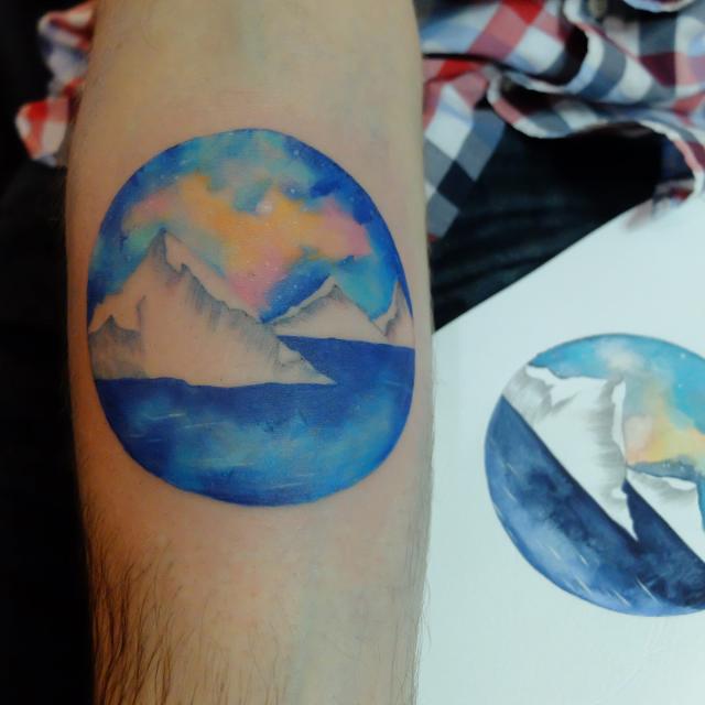 watercolor sunset tattoo