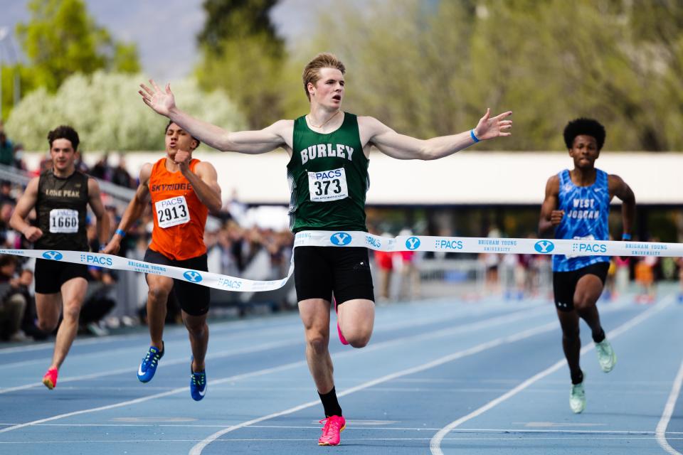 Burley’s Gatlin Bair looks at the screen after winning the boys 100-meter during the BYU Track Invitational at the Clarence F. Robison Outdoor Track & Field in Provo on May 6, 2023. | Ryan Sun, Deseret News