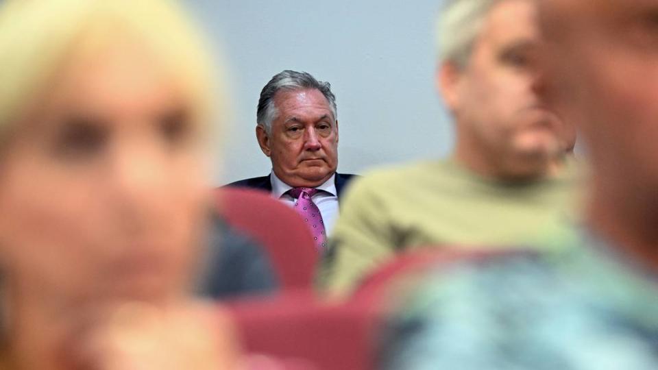 Jon Mast, CEO of the Manatee-Sarasota Building Industry Association, watches from the audience during a Manatee Board of County Commissioners meeting on Thursday, Oct. 5, 2023.