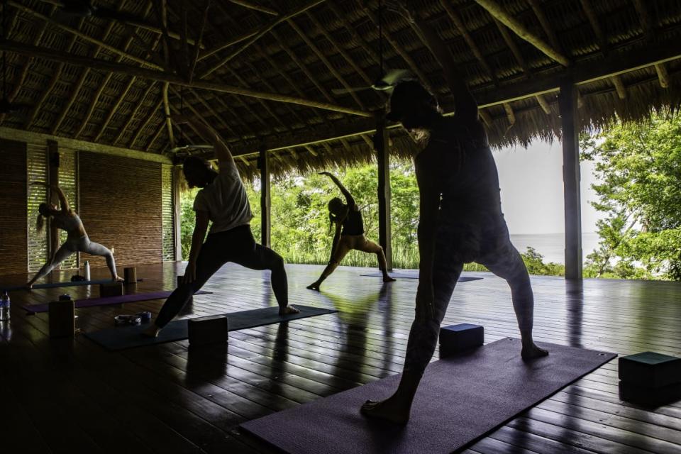 <div class="inline-image__caption"><p>A morning yoga class at Rancho Santana.</p></div> <div class="inline-image__credit">Sarah Rogers/The Daily Beast</div>