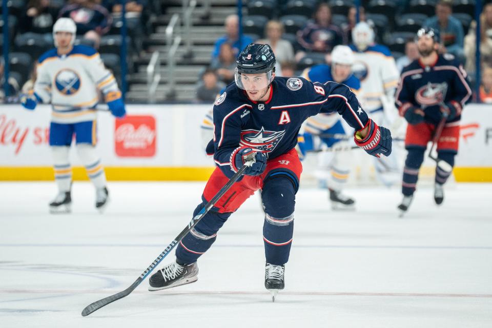 Oct 4, 2023; Columbus, Ohio, United States;
Columbus Blue Jackets defenseman Zach Werenski (8) races down the rink for the puck during their game against the Buffalo Sabres on Wednesday, Oct. 4, 2023 at Nationwide Arena.