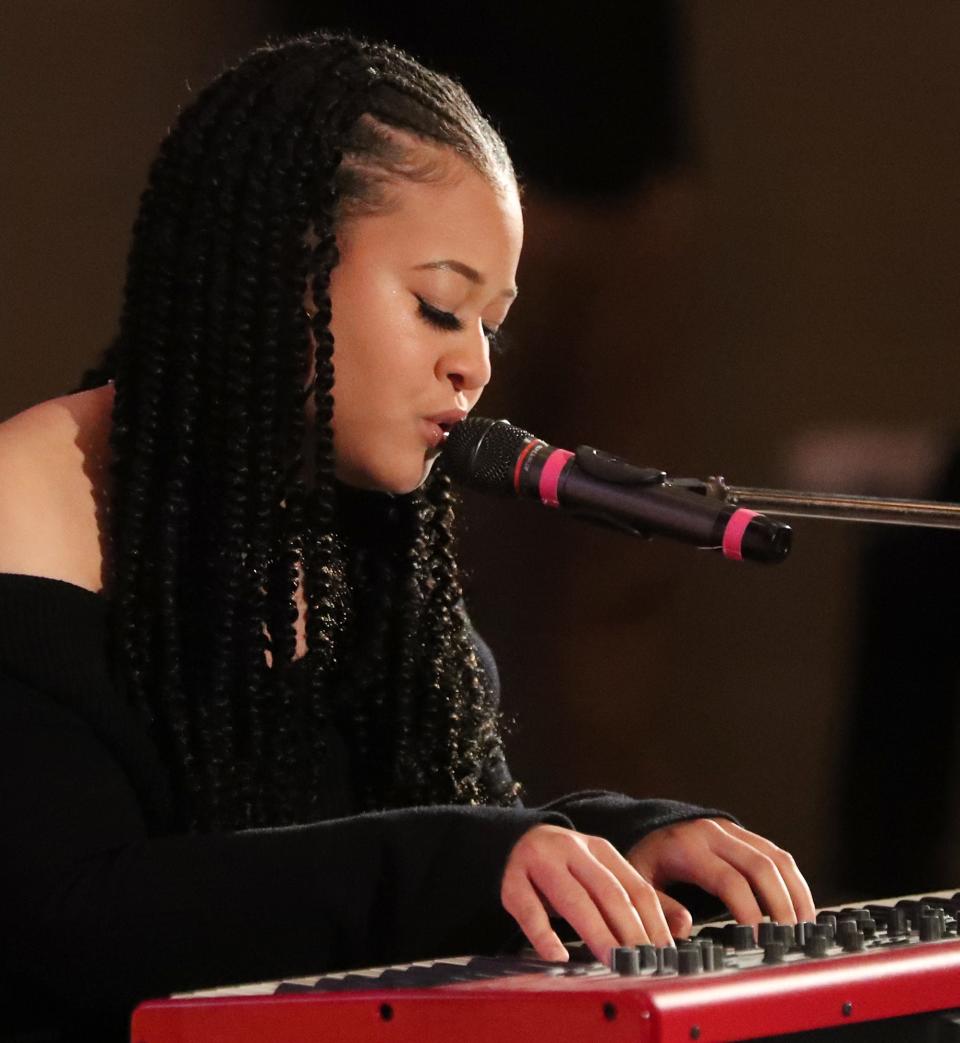 Serrin Joy, who attended Miller South School for the Visual and Performing Arts and competed on American Idol in 2021, performs for students at Miller South on Thursday.