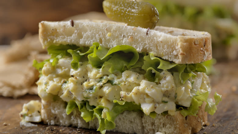 Egg salad sandwich with pickle 