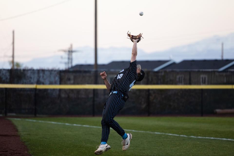 Canyon View’s Hutson Slack (10) reaches for the ball during the 3A boys baseball quarterfinals at Kearns High School in Kearns on May 11, 2023. | Ryan Sun, Deseret News