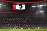 Players observe a minute of silence for the recently deceased Argentinian soccer legend Diego Maradona prior the start of the Champions League Group A soccer match between Bayern Munich and RB Salzburg at the Allianz Arena in Munich, Czech Republic, Wednesday, Nov. 25, 2020. (AP Photo/Matthias Schrader)