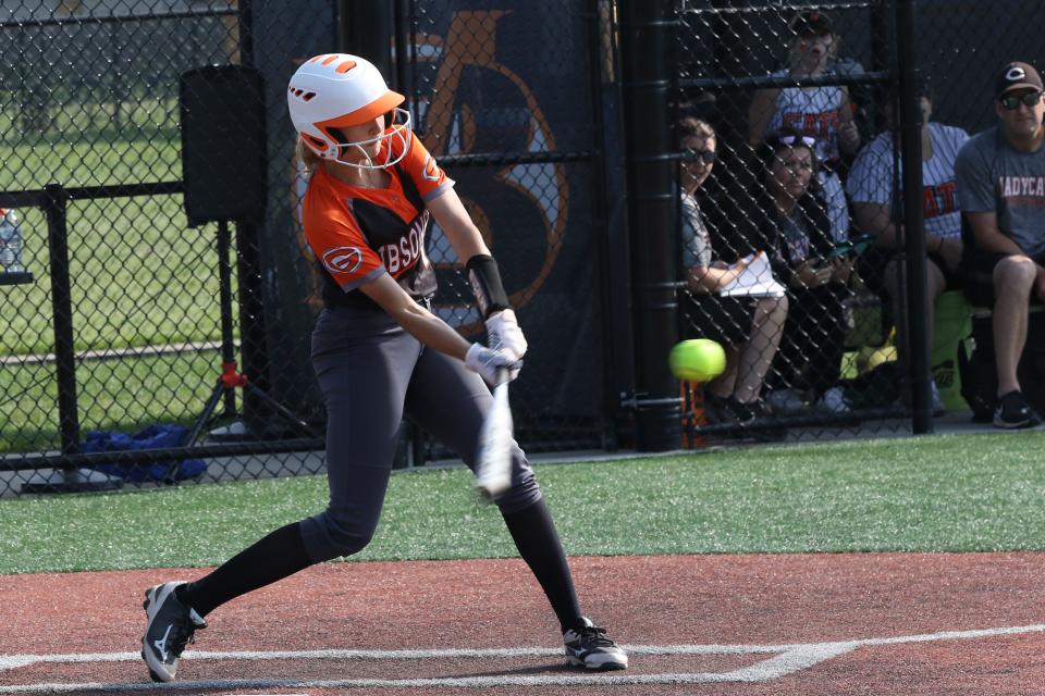 Gibsonburg's Leah Hall swings at a pitch.